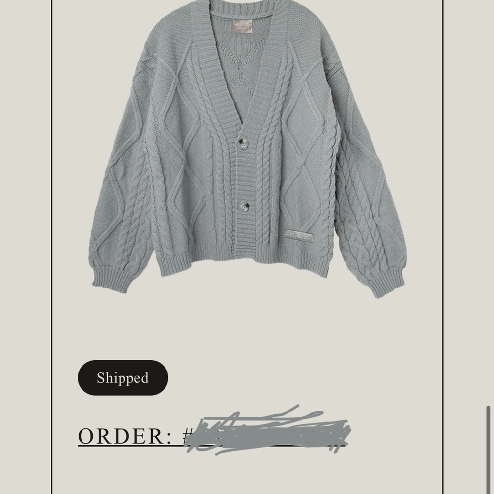 Dusty blue cardigan sweater with V-neck chunky knit and long balloon sleeves